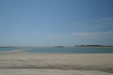 Tranquil beach scene serene coastline nature photography calm waters panoramic view peaceful escape for mindfulness