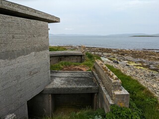 Abandoned concrete structure by the sea