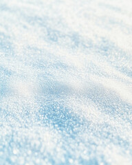 Obraz premium Pristine snow surface showcasing delicate patterns and gentle shadows under soft blue light