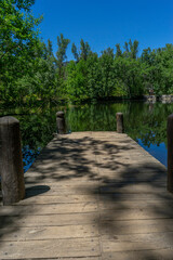 Wooden Pier in the Serene Finnish Forest of Rascafría