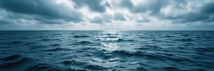 Ocean waves stretch across the vast expanse of the sea as clouds shroud the sun above, coastal landscapes, seascape