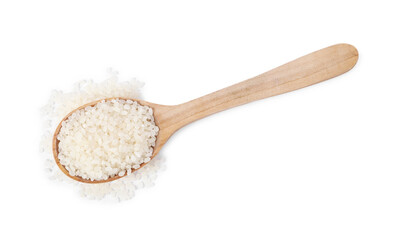 Raw rice in wooden spoon isolated on white, top view