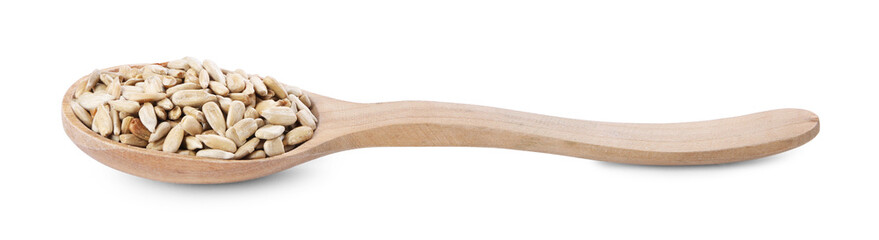 Peeled sunflower seeds in wooden spoon isolated on white