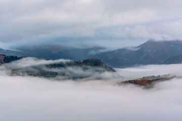 Morning mist over Seiser Alm in the Dolomites, Italy.