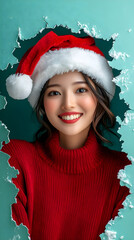 Happy Christmas Woman in Red Sweater and Santa Hat Peeking Through Torn Paper