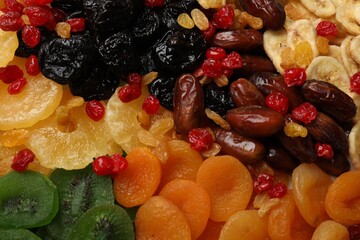 Mix of different dried fruits as background, closeup