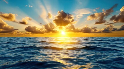 Obraz premium Stunning sunset over the ocean, vibrant colors lighting up the sky and water.