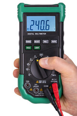 Hand Holding Green Digital Multimeter Displaying Voltage