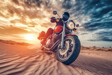 Riding into the sunset, a man on a motorcycle navigates the sandy dunes under dramatic clouds and vibrant sunset colors