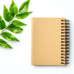 Stylish notebook with green leaf accents.