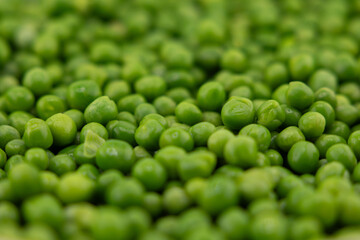 Green Peas. Green background. Peas background. Top view.