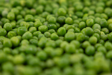 Green Peas. Green background. Peas background. Top view.