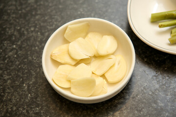 sliced garlic on a plate