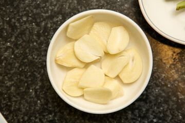 sliced garlic on a plate