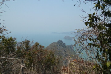 Hiking adventure overlooking coastal cliffs serene nature scenic viewpoint tranquil environment outdoor exploration
