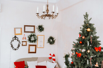 Cozy holiday living room with Christmas tree and festive decorations