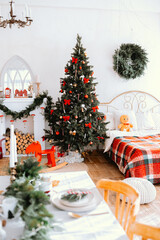 Cozy Christmas living room with a decorated tree and festive decor