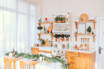 Cozy holiday kitchen decorated with natural elements and festive colors