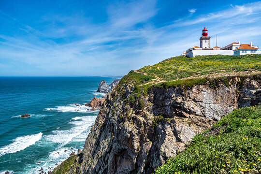 Lighthouse on Cabo da Roca - Roca Cape in Portugal, westernmost point of the Sintra Mountain Range and Europe