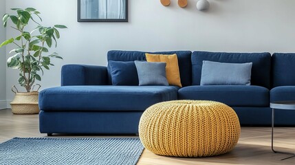 Sophisticated Living Room Design with Blue Sofa and Mustard Accent