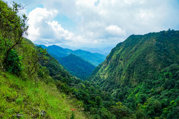 Fototapeta premium Exploring lush mountain valleys scenic landscape nature photography tropical environment panoramic view adventure awaits