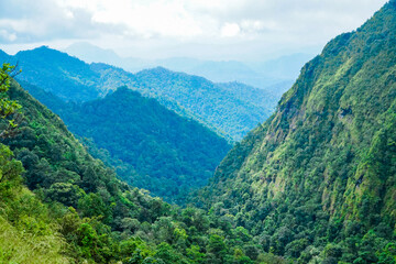 Exploring majestic mountain views lush valleys nature photography serene landscape aerial perspective adventure travel © InfoSoul