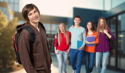 Obraz premium Handsome young college student in campus