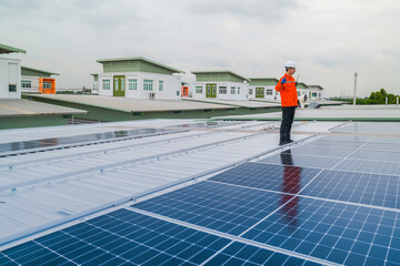 close up on grid of technology renewable solar energy. construction solar panels system on roof....