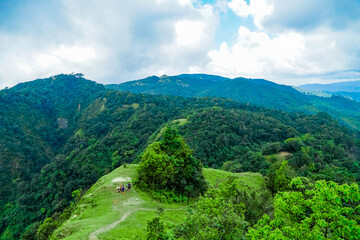 Exploring nature's majesty hiking adventure in lush mountains scenic overview outdoor environment...