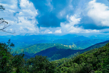 Breathtaking mountain view scenic landscape nature photography lush greenery overcast sky tranquility and adventure