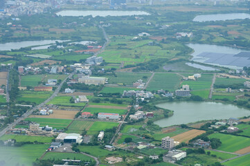 Looking from airplane of the Taipei city view, Taiwan. Ariel view of Taipei cityscape. Stunning...