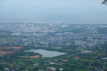 Looking from airplane of the Taipei city view, Taiwan. Ariel view of Taipei cityscape. Stunning...