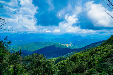 Breathtaking mountain landscape view majestic peaks nature photography lush greenery wide angle serenity in nature