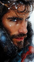  a man with blue eyes and a beard standing in the snow He is wearing a jacket and the background is blurred, giving the image a dreamy feel
