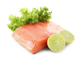 Piece of fresh salmon, lime and lettuce isolated on white