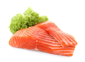 Pieces of fresh salmon and lettuce isolated on white