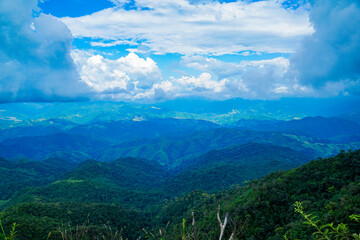 Obraz premium Breathtaking mountain vista scenic overlook nature photography cloudy skies panoramic view tranquil landscape for adventure lovers