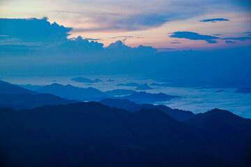 Breathtaking sunrise over mountain peaks nature landscape outdoor adventure serene atmosphere panoramic view tranquility of the wild