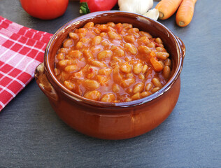 Tasty baked beans on tomato sauce