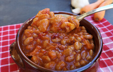 Tasty baked beans on tomato sauce