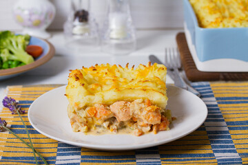 Creamy fish pie or fisherman's pie - traditional British and Irish dish