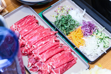 beef for shabu shabu on a plate