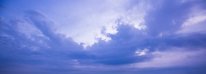 Clouds and blue sky background,blue sky background with tiny clouds,clear blue sky with a few clouds. The sky is very bright and the clouds are scattered throughout