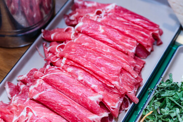 beef for shabu shabu on a plate