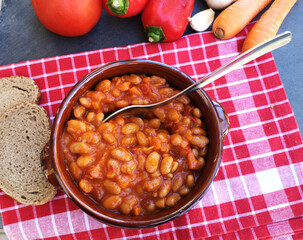 Tasty baked beans on tomato sauce
