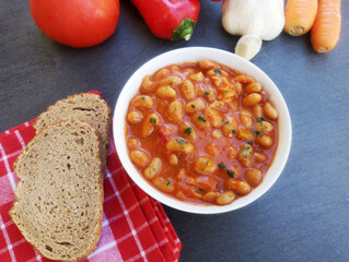 Tasty baked beans on tomato sauce