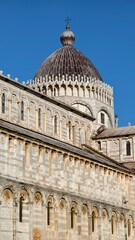Fototapeta premium The famous architecture in Pisa city. Piazza del Duomo, Battistero di San Giovanni, Leaning Tower, Cattedrale di Pisa