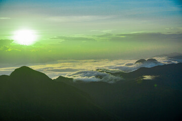 Sunrise over mountain peaks scenic landscape nature photography tranquil environment wide-angle view natural beauty