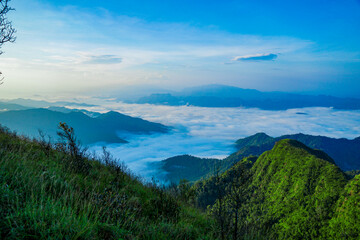Breathtaking sunrise over mountainous landscape nature scene thai highlands scenic view tranquil atmosphere awe-inspiring beauty