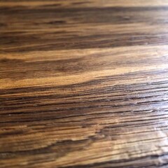 Fototapeta premium A photo of a wooden table surface with a realistic texture, showcasing detailed grain, natural wear, and the variations in color and sheen of the wood.
